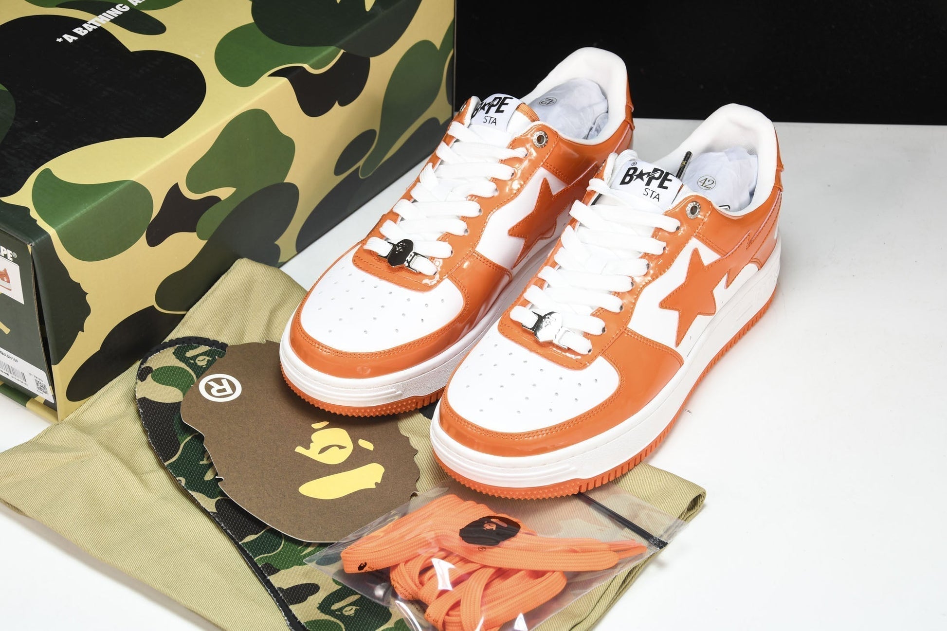Vibrant BAPE STA Low Orange Leather Sneakers for Iconic Streetwear Style